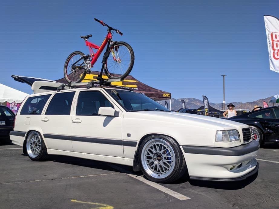 White Volvo 850 wagon on BBS wheels at a car meet